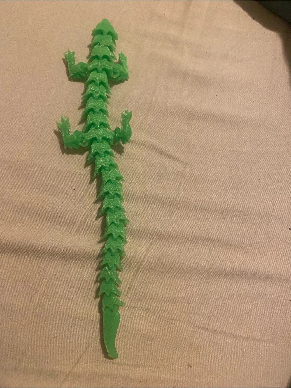 3-D green printed articulated dragon